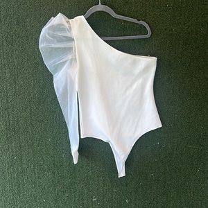 NWOT one shoulder white rubbed bodysuit. Brand is TCEC and it’s never been worn